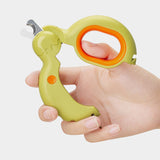 Pet Nail Clippers with a creamy donut design held in hand for safe and easy grooming of cats and dogs.